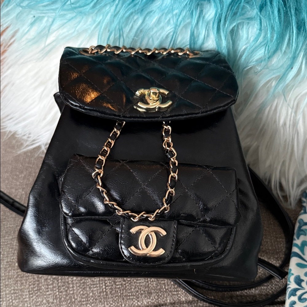 Quilted Black Backpack with Gold Details